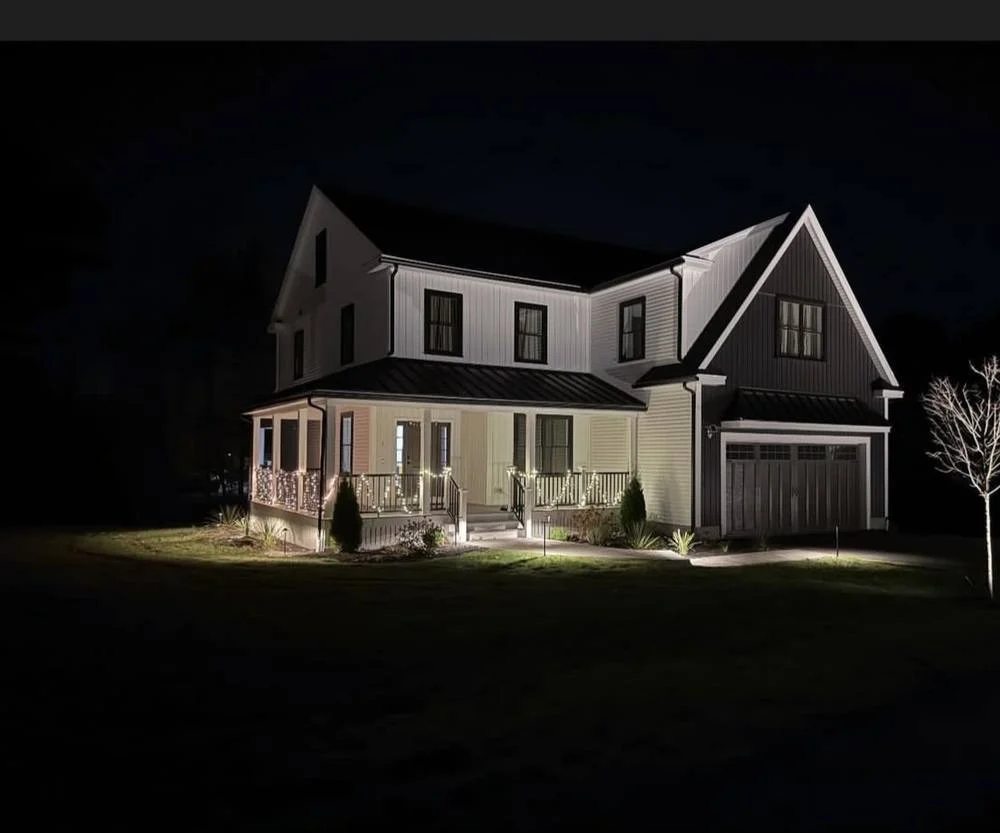Outdoor landscape lighting installation by P.J. Pappas