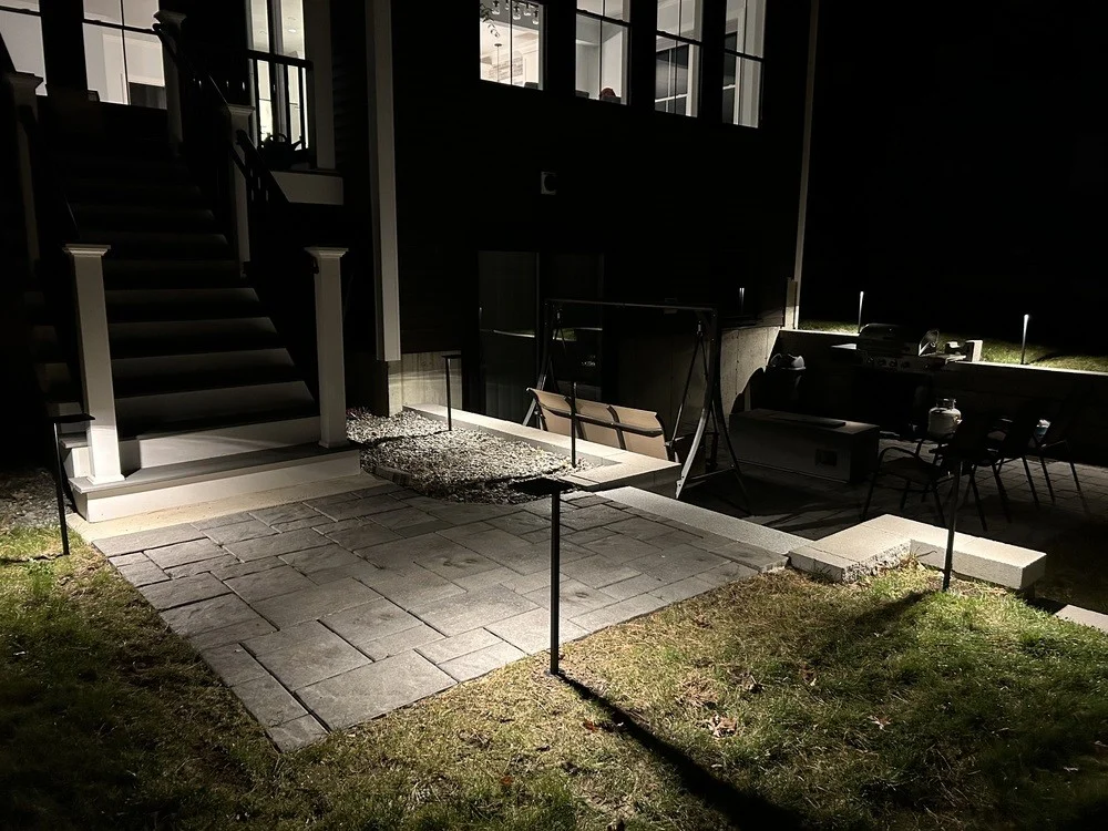 Outdoor landscape lighting installation by P.J. Pappas