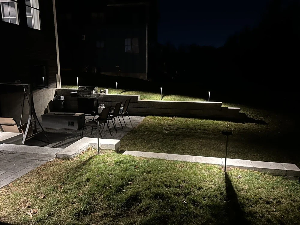 Outdoor landscape lighting installation by P.J. Pappas