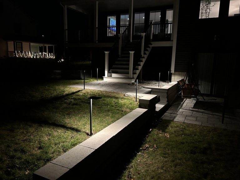 Outdoor landscape lighting installation by P.J. Pappas