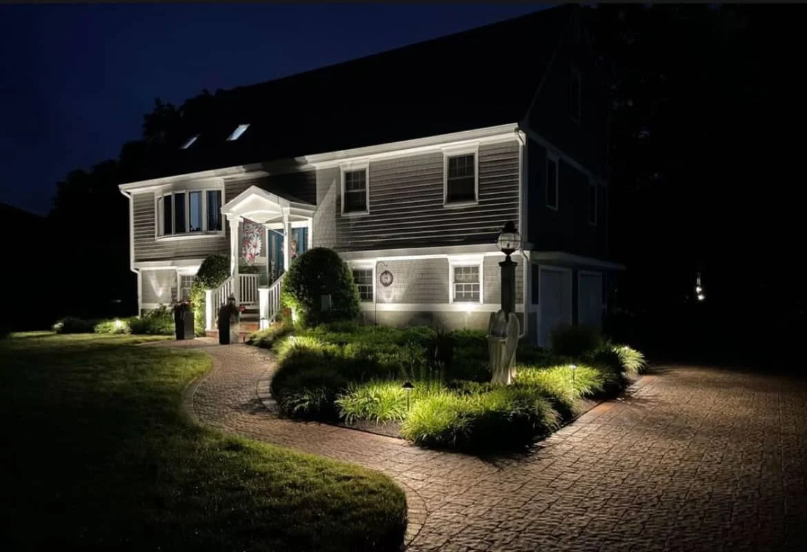 Outdoor landscape lighting installation by P.J. Pappas