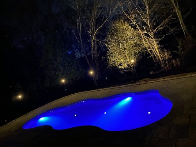 Outdoor landscape lighting installation by P.J. Pappas