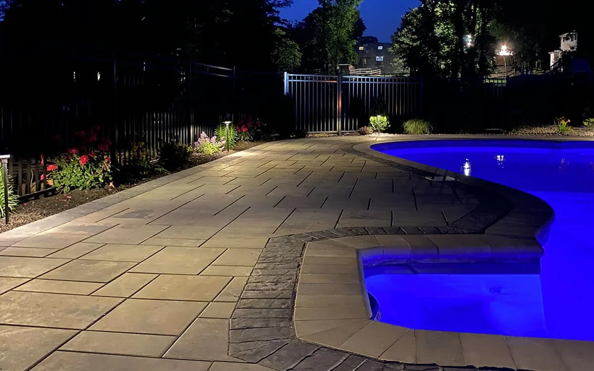 Outdoor landscape lighting installation by P.J. Pappas