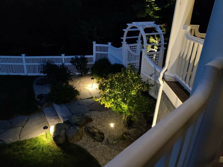 Outdoor landscape lighting installation by P.J. Pappas