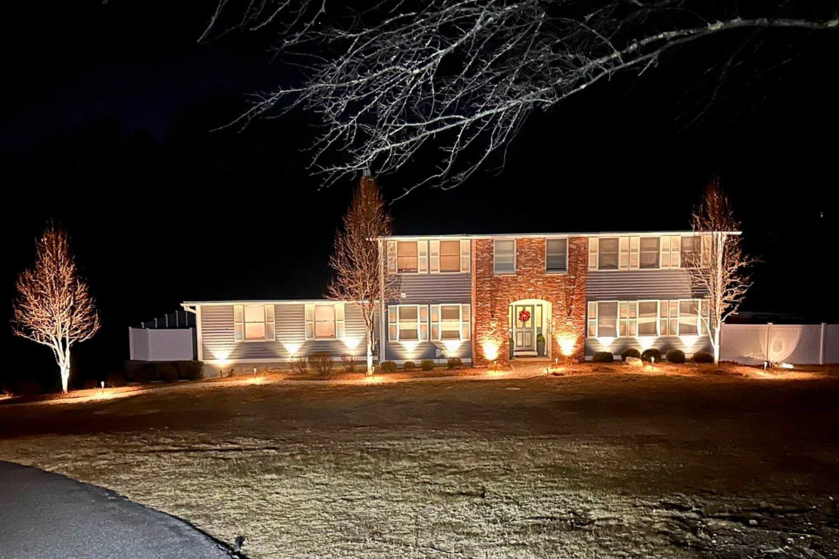 Outdoor landscape lighting installation by P.J. Pappas