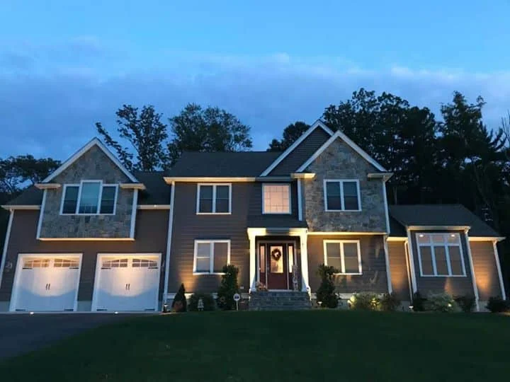 Outdoor landscape lighting installation by P.J. Pappas
