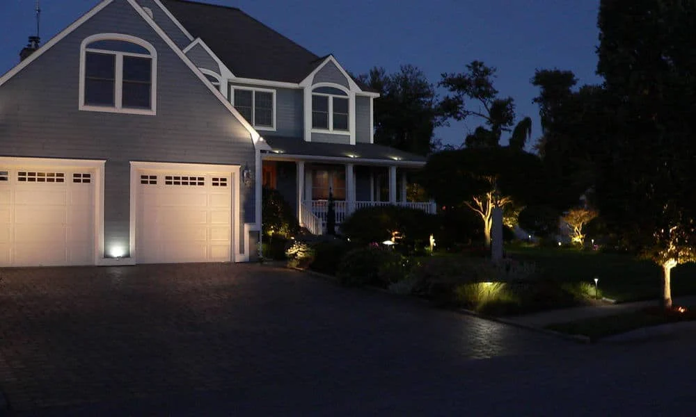Outdoor landscape lighting installation by P.J. Pappas