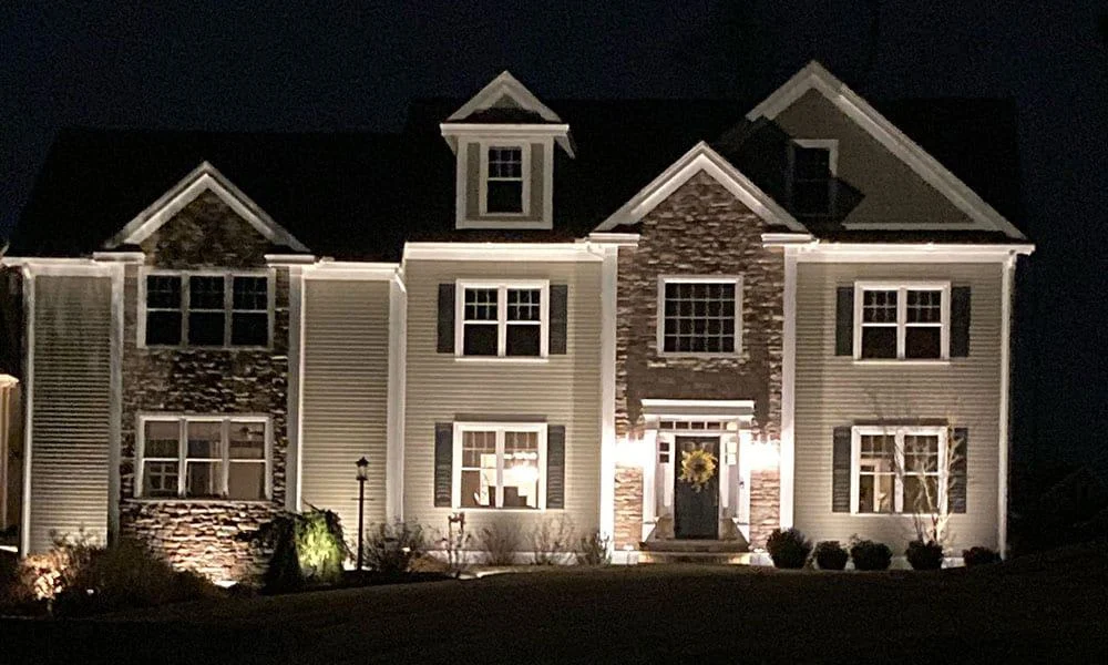 Outdoor landscape lighting installation by P.J. Pappas