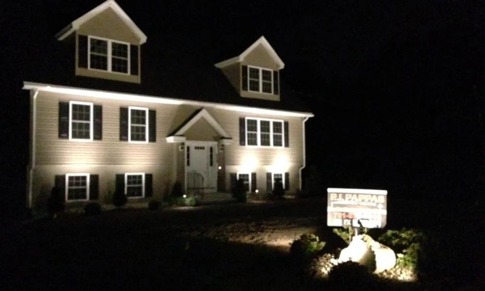 Outdoor landscape lighting installation by P.J. Pappas