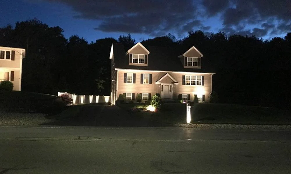Outdoor landscape lighting installation by P.J. Pappas
