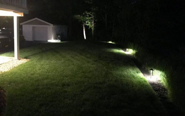 Outdoor landscape lighting installation by P.J. Pappas