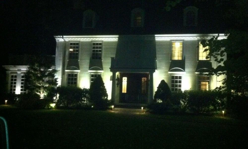 Outdoor landscape lighting installation by P.J. Pappas