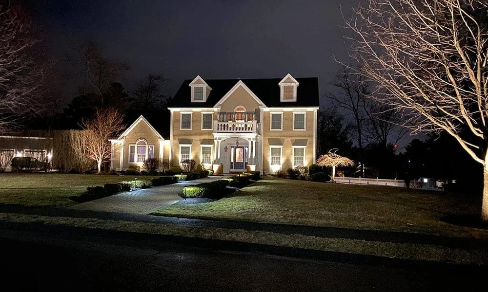 Outdoor landscape lighting installation by P.J. Pappas