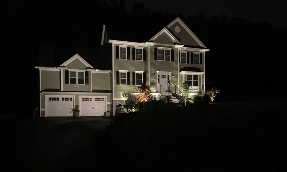 Outdoor landscape lighting installation by P.J. Pappas