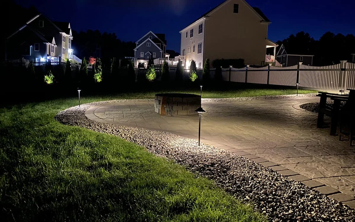 Outdoor landscape lighting installation by P.J. Pappas