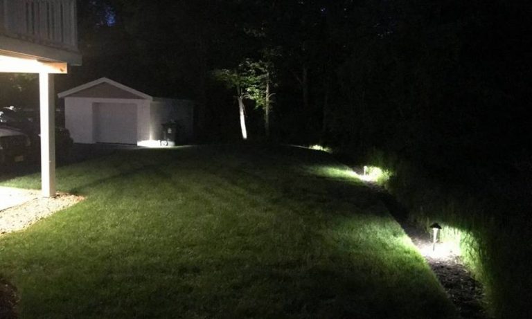 Outdoor landscape lighting installation by P.J. Pappas