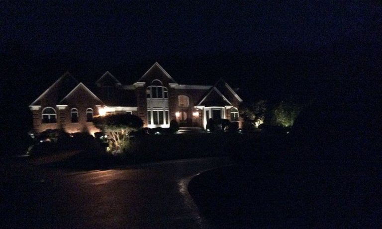 Outdoor landscape lighting installation by P.J. Pappas