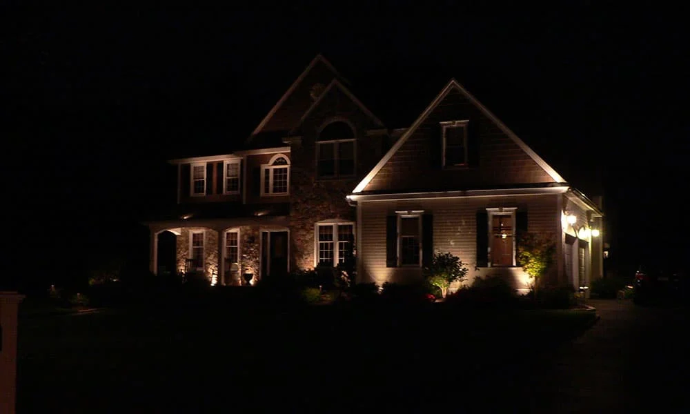 Outdoor landscape lighting installation by P.J. Pappas